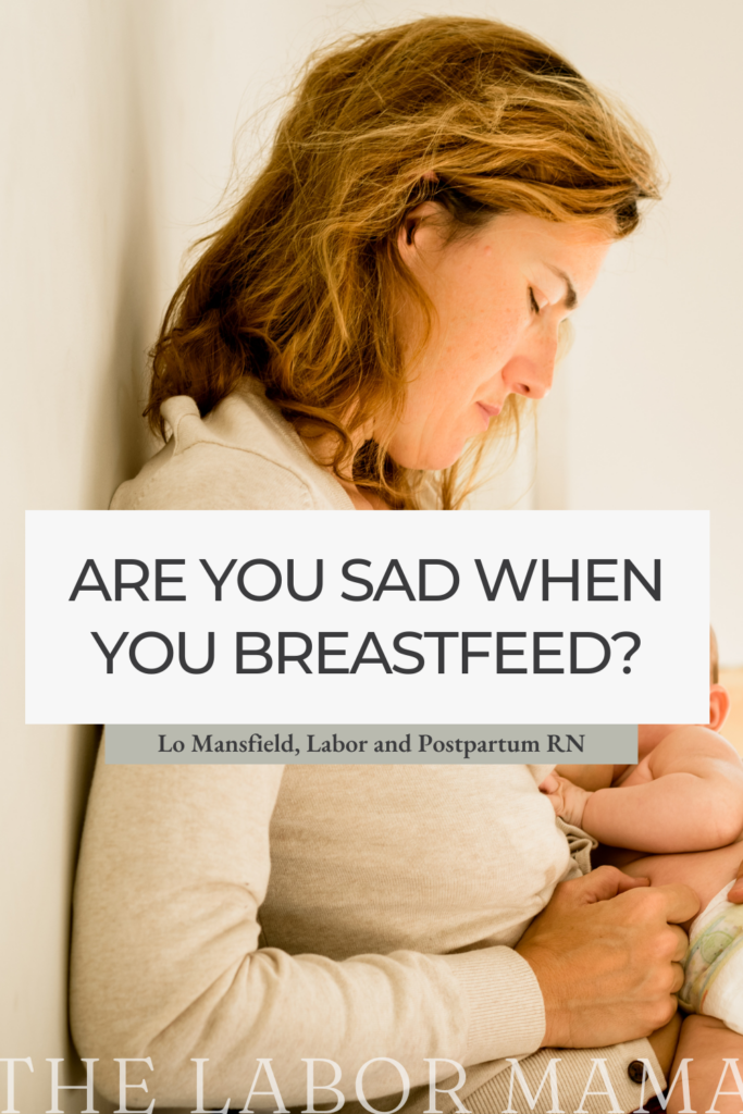 postpartum mom breastfeeding baby
