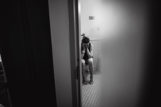 fresh postpartum mom first trip to the bathroom
